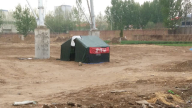 Local government sent personnel to set up a checkpoint next to the Bishop Fan’s grave and guard the site.