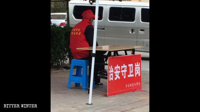 Security checkpoint at a village entrance.