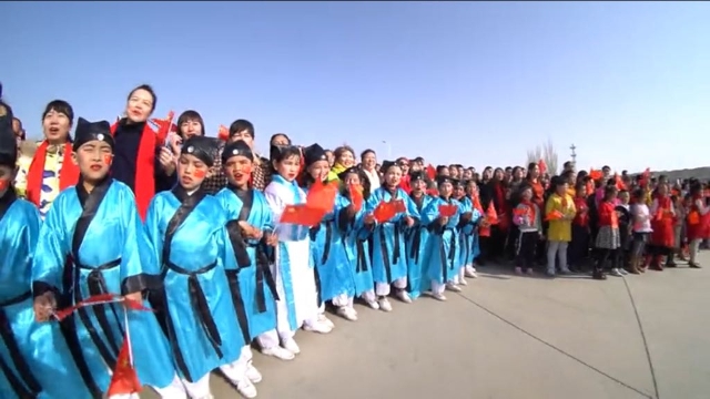 Uyghur children are forced to dress in ancient Chinese national costumes to welcome in the Uyghur Spring holiday, Navruz.