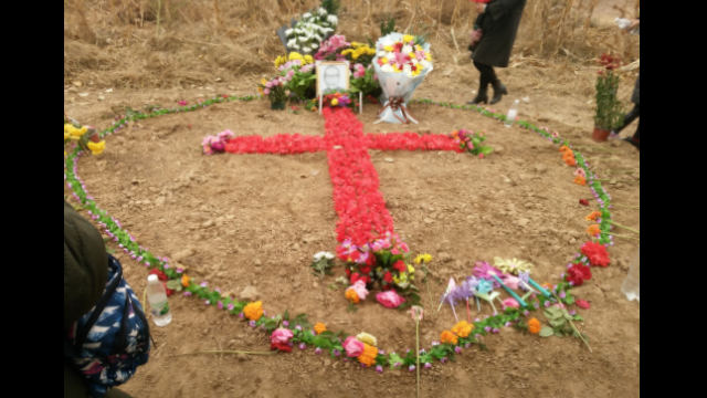 Paying homage to Bishop Fan in 2018, churchgoers formed a cross with flowers.