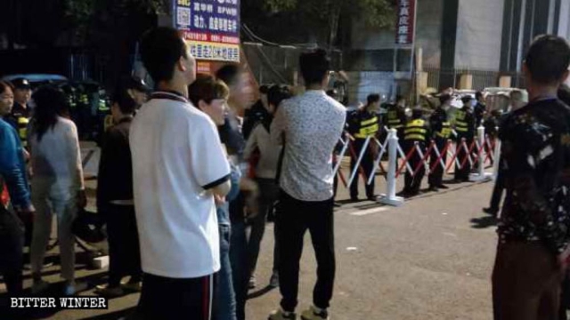The police set up a checkpoint at the entrance and stopped believers outside the church