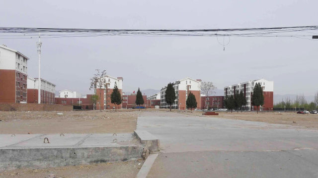 Photos provided by residents show that Beida Mosque in Sancun village has been razed to the ground; only a cement platform for flagpole has been left behind.