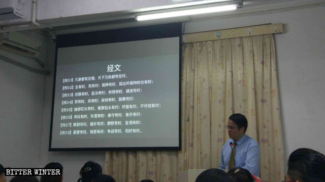Pastor Yang Xibo is preaching.