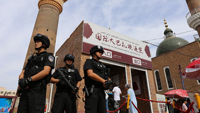 Special police on duty on a street in Xinjiang.