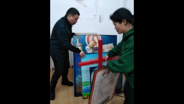 The cross and other church symbols were dismantled