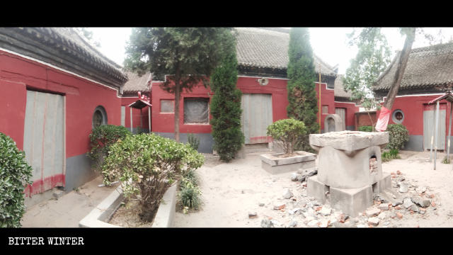 The temple’s doors were sealed off with iron sheets, and the incense burner was destroyed.