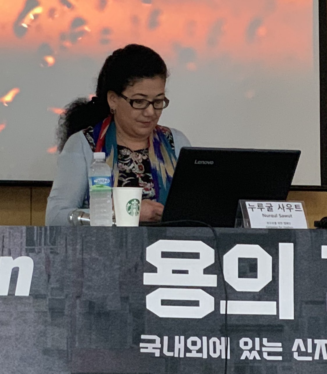 Ms. Nurgul Sawut at the conference. Does she look like an extremist Muslim?