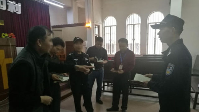 Police officers and Religious Affairs Bureau officials