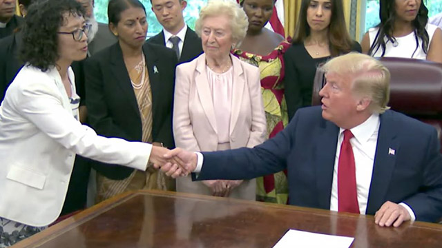 President Trump meeting Falun Gong practitioner Zhang Yuhua