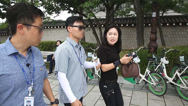 The irritated Ms. O was stopped by security guards