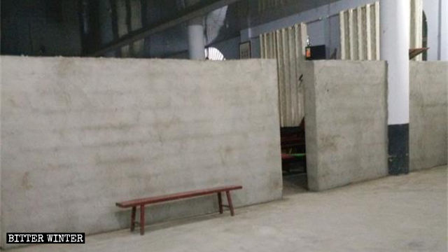A wall was erected in the church’s first-floor lobby