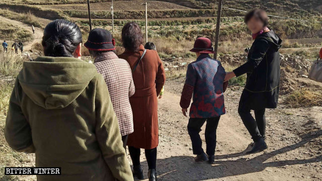 Believers traverse mountain roads to the meeting spot